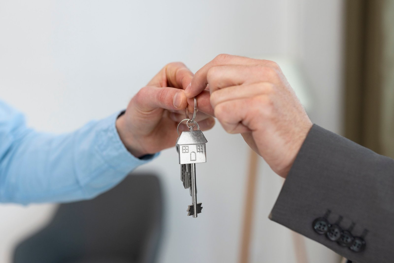 keys-being-held-by-real-estate-agent-buyer